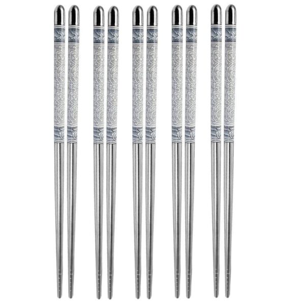 Sleek silver stainless steel chopsticks neatly arranged in a box"